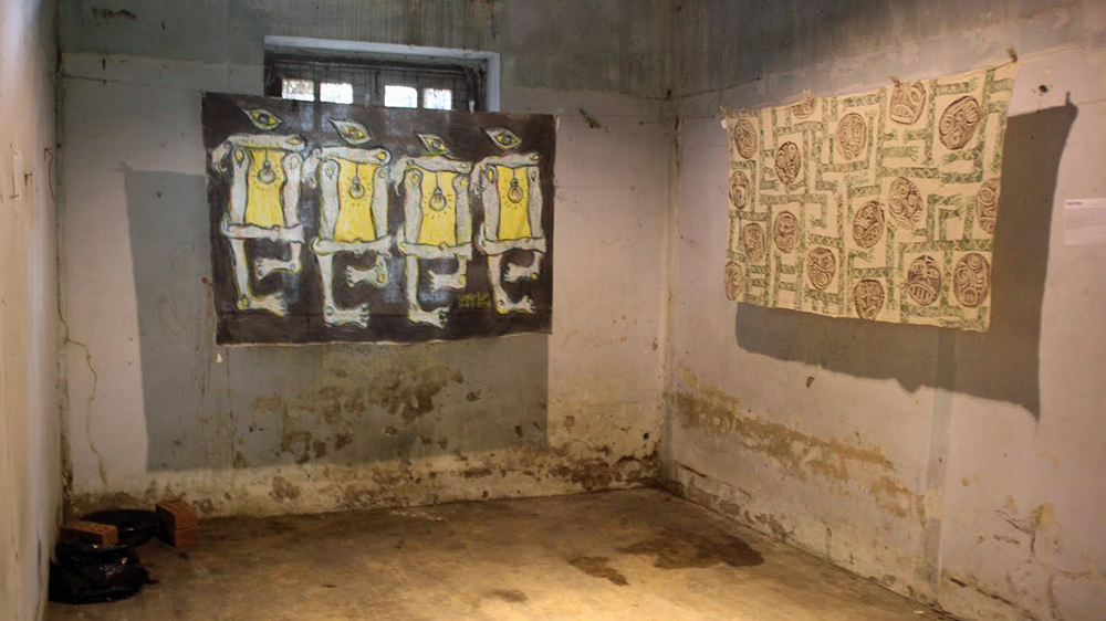 The artwork was inspired by experiences of torture and imprisonment [Mark Fenn/Al Jazeera]