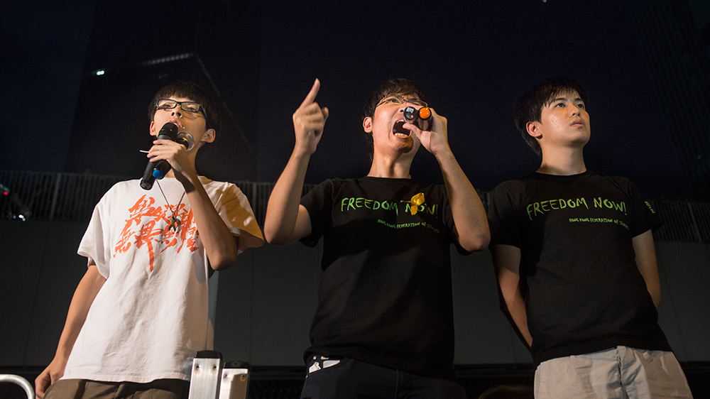 In 2012, at age 15, Wong mobilised about 120,000 protesters onto Hong Kong's streets [Miguel Candela/Al Jazeera]