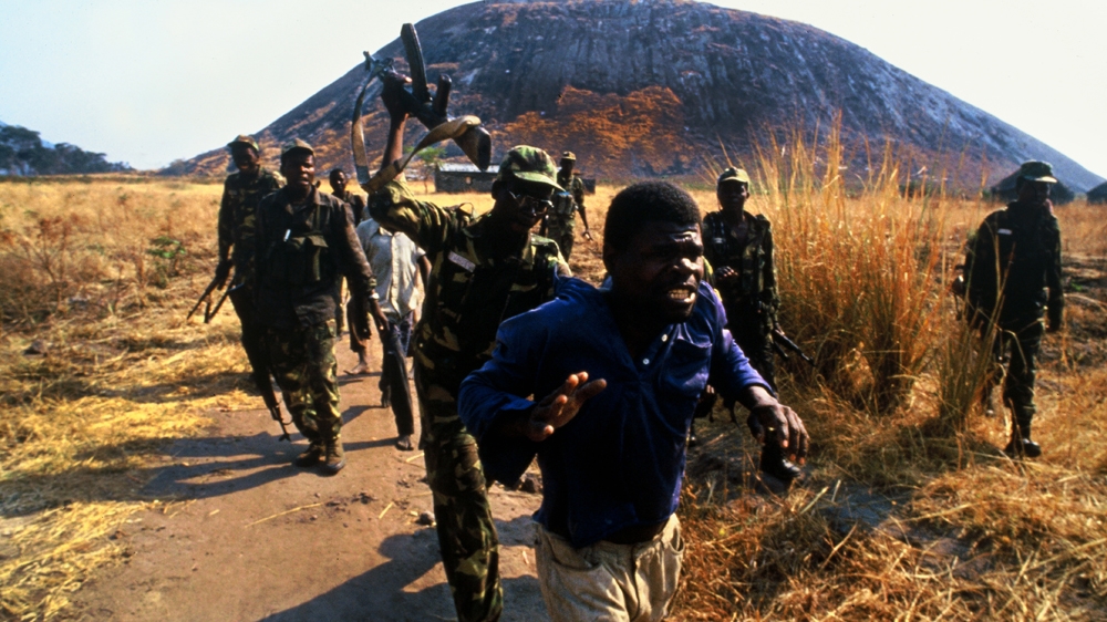 A young man is beaten by MPLA soldiers during Angola's civil war. The MPLA was applying forceful conscription on villagers, but the man being beaten had rejected the government soldiers' insistence that he join them. After my pictures (and others from the same series) of this man being shot were published widely in Europe there was public outrage. Many people branded me a vulture and a voyeur in another person's misery. Many also asked if the soldiers were doing it for the camera and why I hadn't stopped the beating and shooting. My answer to the first question was that it was already in motion before I began photographing. To the second question, I responded: 