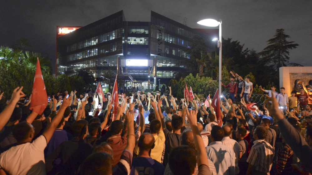 Demonstrators shouted nationalist slogans during a protest in front of the headquarters of the Hurriyet newspaper in Istanbul [Reuters]