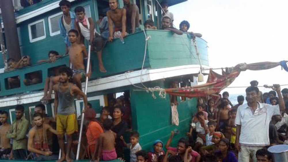 Smugglers often exploit the desperation of migrants and refugees and put their lives at risk in dangerous boat journeys [AFP]