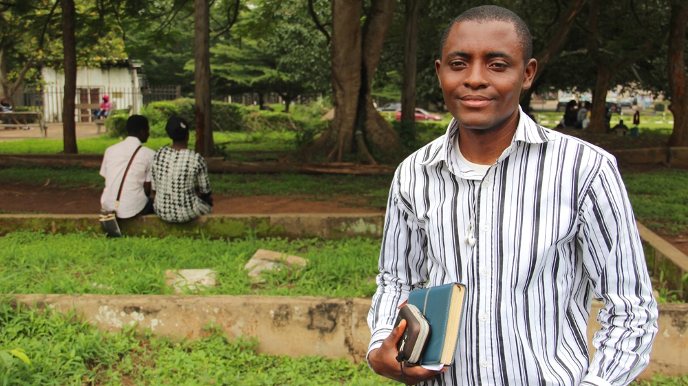 Sunday Olawale Olaniran stumbled across Michael Taiwo  Akinkunmi  's story in 2006. He says the older man's plight at the time brought him to tears. But his role in shaping Nigerian identity has since been more broadly recognised [Femke van Zeijl/Al Jazeera]