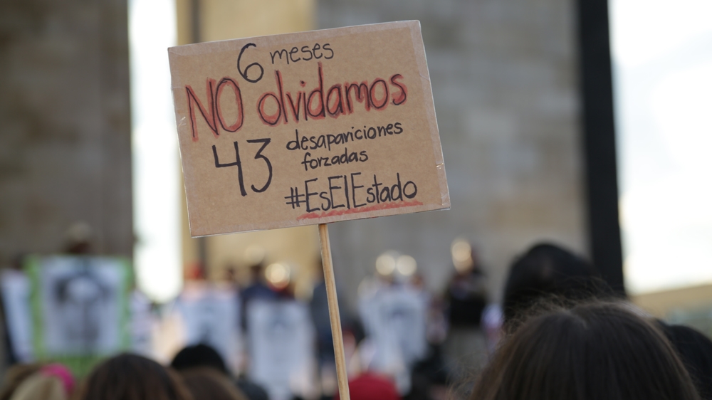 
The disappearance of the missing students triggered widespread protests with activists blaming the government for their abduction [Al Jazeera]
