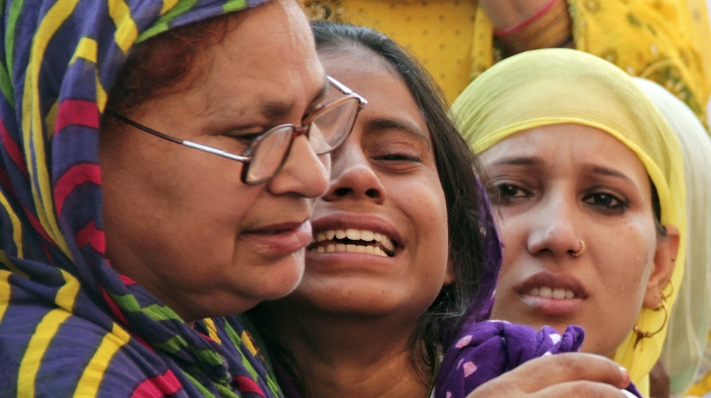 Relatives of Akhlaq mourn after he was killed by a mob on Monday night, at his residence in Dadri town