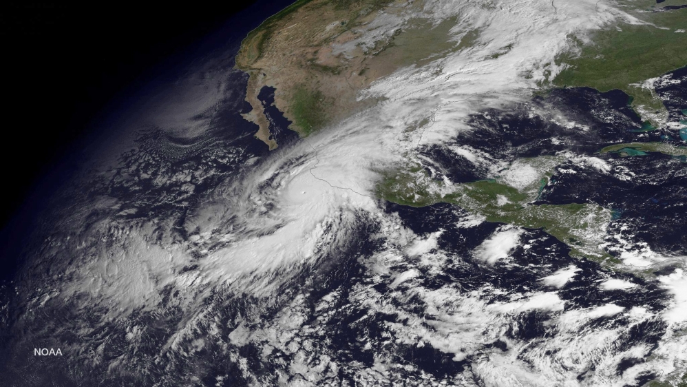 Hurricane Patricia, a category 5 storm, is seen approaching the coast of Mexico in a NOAA satellite image [Reuters]