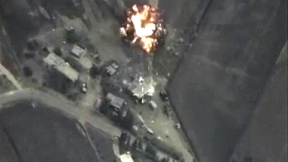 A frame grab taken from footage released by Russia's Defence Ministry September 30, 2015, shows precise air strikes carried out by the country's air force on Wednesday [Reuters]