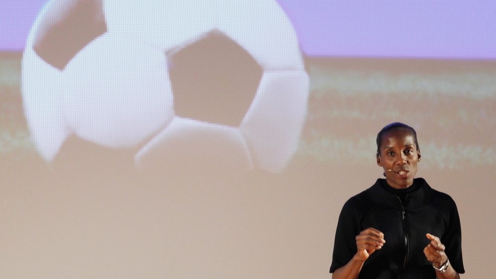 May, a former athlete, speaking at the Italian Football Federation event against racism [Getty Images]