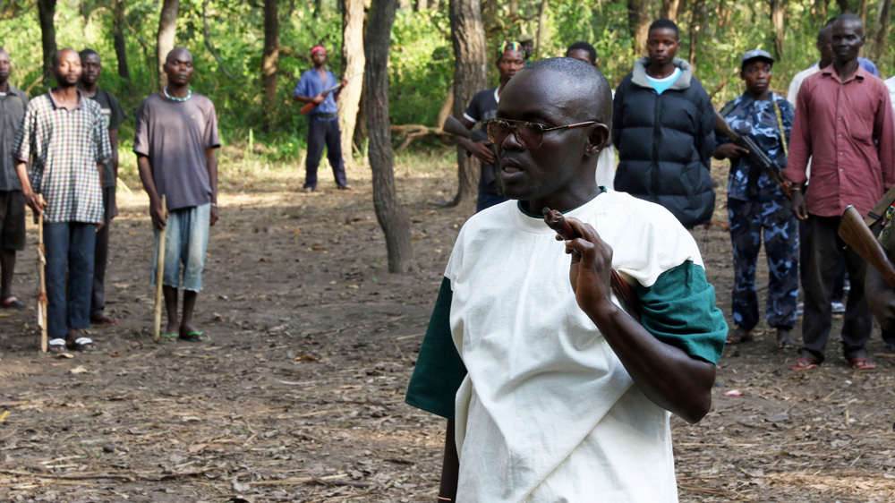 Victor Mwanga, commander of an armed group called the South Sudan National Liberation Movement, addresses his troops near Yambio [Simona Foltyn/Al Jazeera]