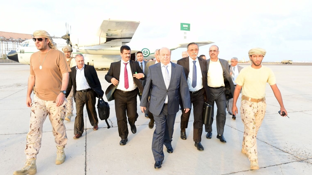 Handout photo of Yemen''s exiled President Abd-Rabbu Mansour Hadi walking at Aden airport upon his arrival from Saudi Arabia
