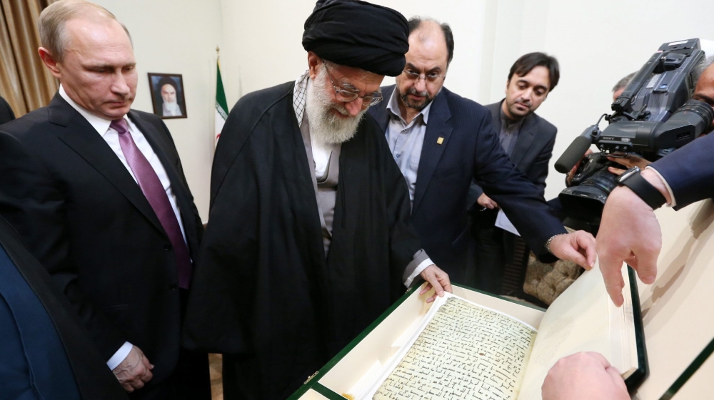 Russian President Vladimir Putin visits with then-Iranian supreme leader Ayatollah Ali Khamenei in Tehran [EPA/handout]