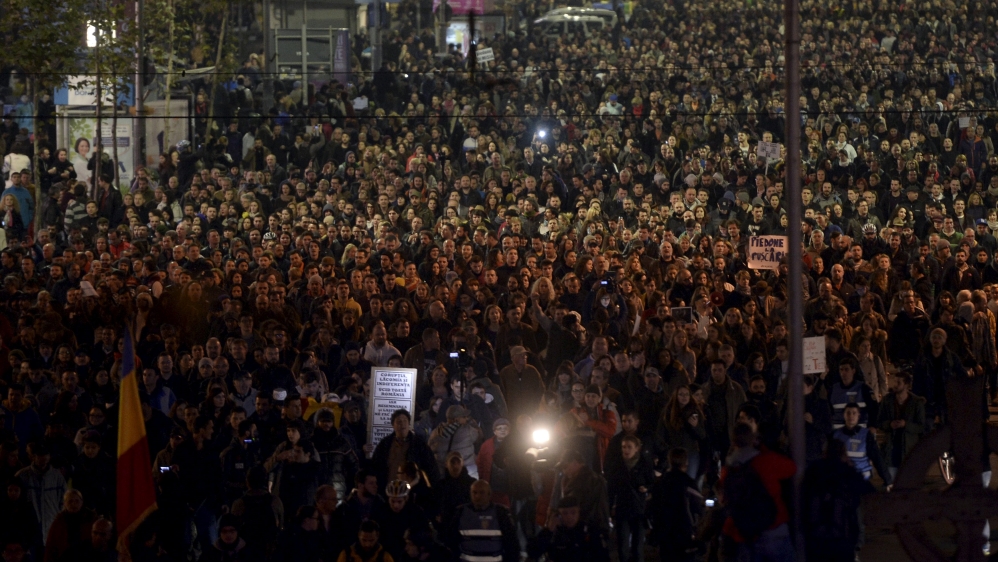 Thousands of people rally in Bucharest on Tuesday, November 3 [Reuters]