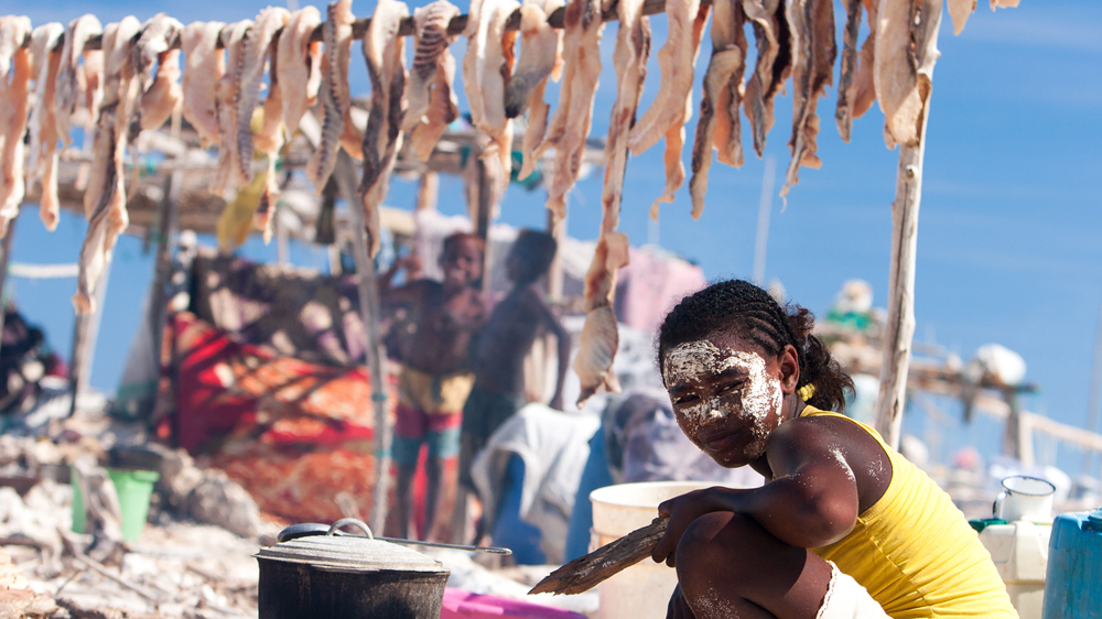Dried and salted shark meat is sold to traders for a couple of dollars from the whole catch [Garth Cripps/Al Jazeera]