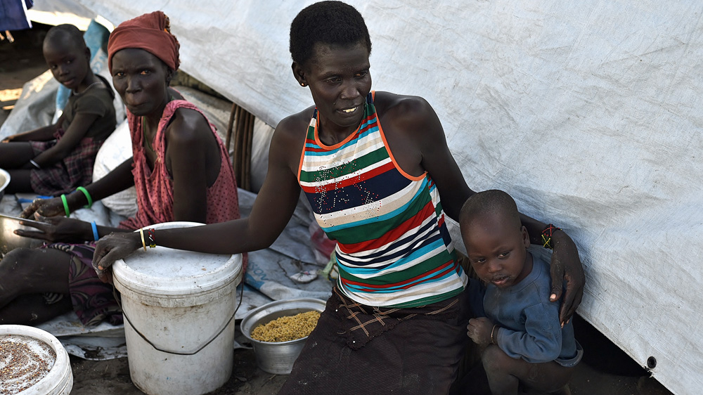 Tabitha Nyapa said she watched four women burned alive in a hut by government allied forces before she escaped to Kok island [Jason Patinkin/Al Jazeera]