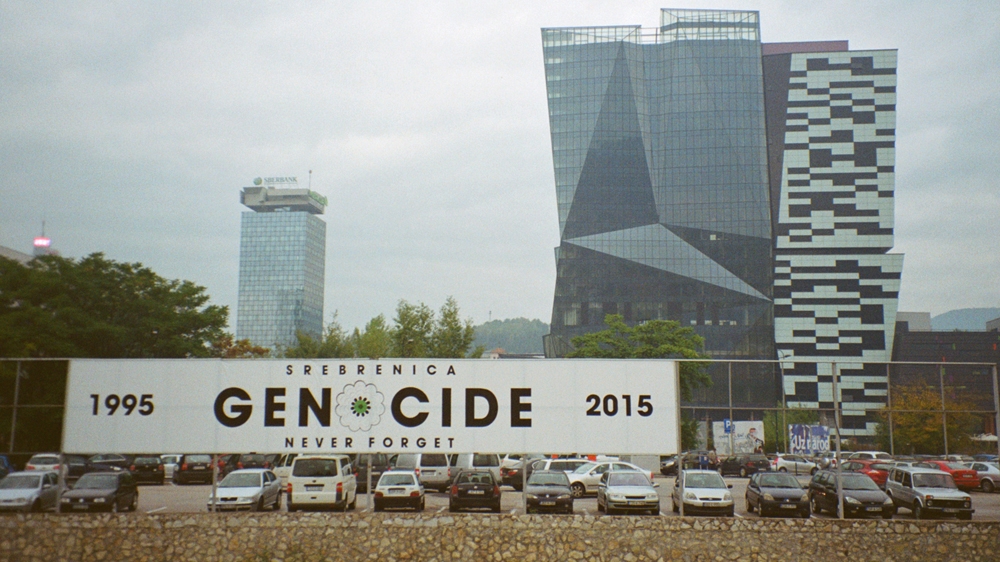 genocide sign Bosnia Sarajevo [Morgan Meaker/Al Jazeera]