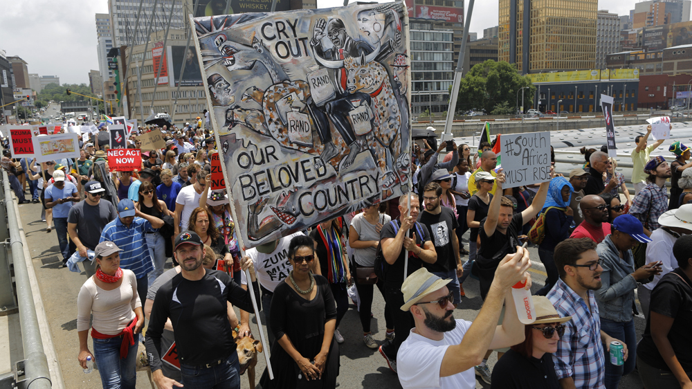 Jacob Zuma has been under increasing pressure to step down over the past two weeks  [Kim Ludbrook/EPA]