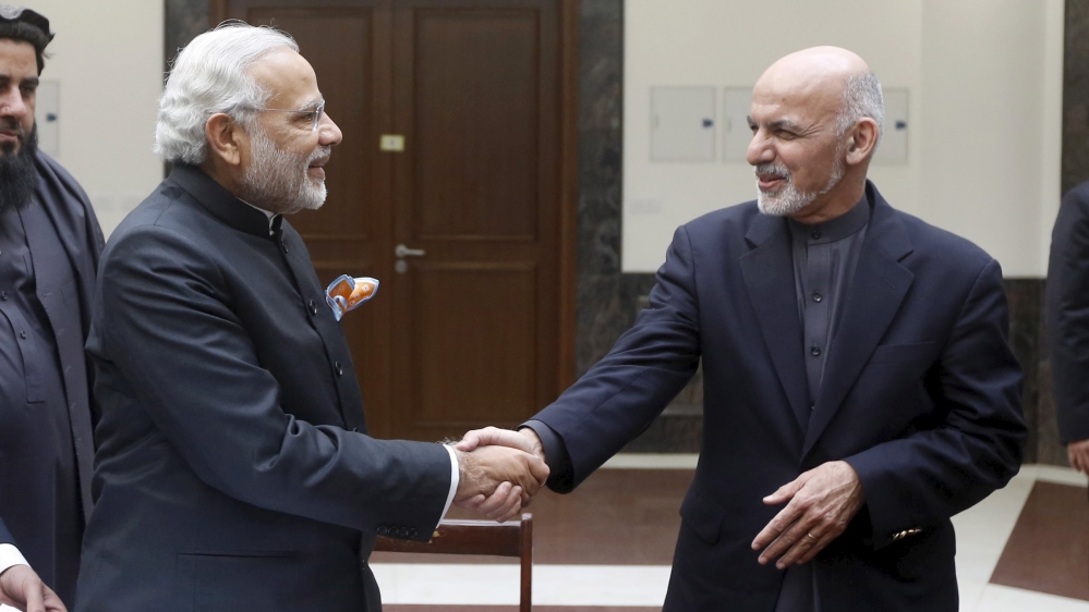 India''s PM Modi shakes hand with Afghanistan''s President Ashraf Ghani during inauguration of Afghanistan’s new parliament building in Kabul