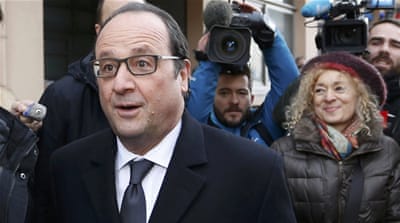 President Hollande has seen his personal ratings surge as a result of his hardline approach since the November 13 attacks but his party fared badly in local polls [Regis Duvignau/Al Jazeera]