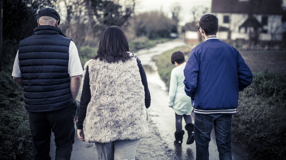 Sharon and Paul say their greatest worry is what will happen to the children when they are no longer around to care for them. They fear theirs will be a future of sheltered accommodation with little or no support from professionals who fully grasp the complexities of their conditions [Michael Mowbray/Al Jazeera] 