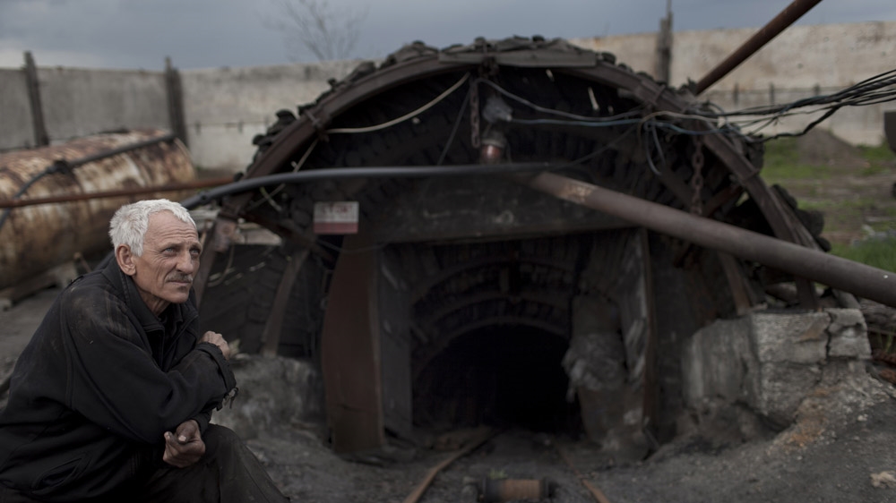 The entrance to an illegal mine near Shakthiorsk. The mine was closed after four young miners were killed in an explosion. [Janos Chiala and Tali Mayer/Al Jazeera]  
