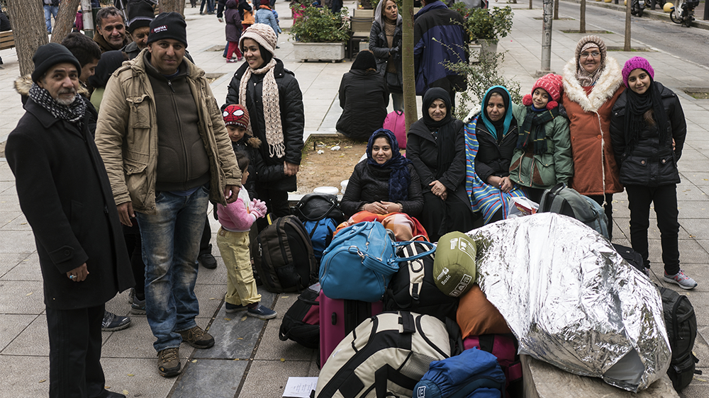 Fairooz and 16 relatives made the journey from Afghanistan to Greece together [Sorin Furcoi/Al Jazeera]
