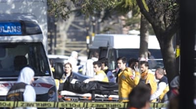 Paramedics carry a body after an explosion near the Blue Mosque in the Sultanahmet district of central Istanbul [EPA]