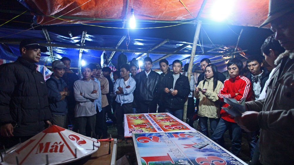 While foreigners may gamble in Vietnam's casinos, poor locals who wish to wager must participate in illegal sports betting [Na Son Nguyen/Al Jazeera]