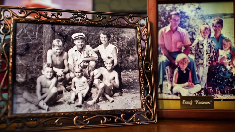 The Wood family at the lake [Ryan Edwardson/Al Jazeera] 
