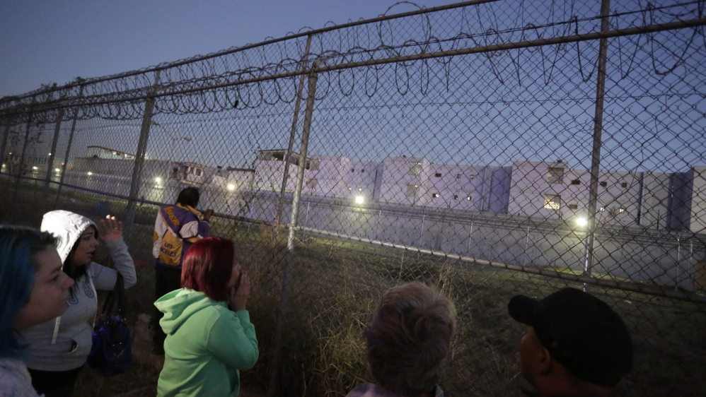 Relatives of prisoners rushed to the scene following reports of deaths  [Daniel Becerril/Reuters]