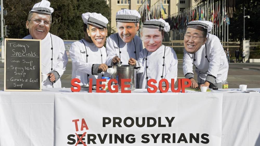 Protests were staged at the UN headquarters in Geneva during the Syria negotiations [Martial Trezzini/EPA]