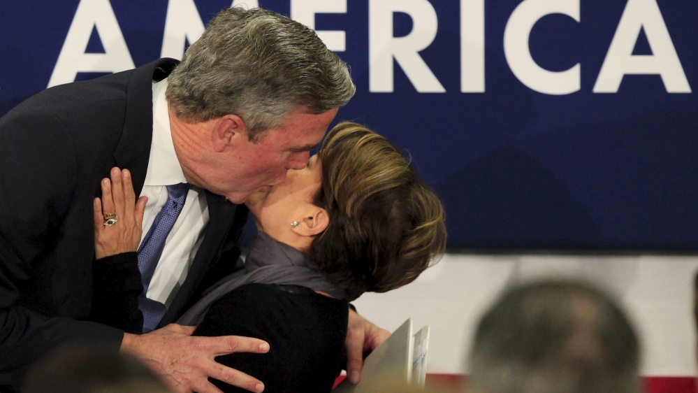 Republican U.S. presidential candidate Jeb Bush kisses his wife Columba in Columbia