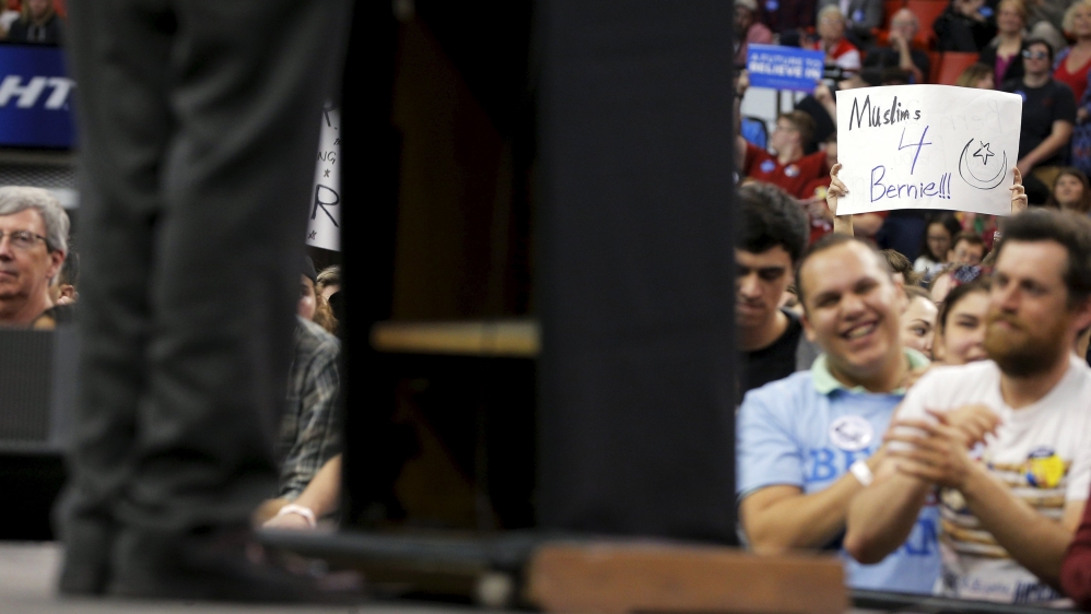 An audience member holds a "Muslims 4 Bernie" sign at a campaign rally with U.S. Democratic presidential candidate and U.S. Senator Bernie Sanders in Oklahoma City