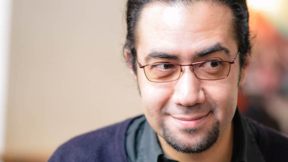 Monis says he likes everything about Berlin and used to feel like a stranger in Damascus [Adrien Le Coarer/Al Jazeera  ]