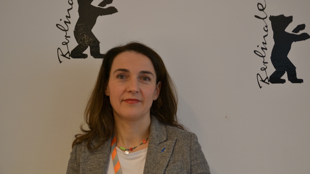 Adrienne Boros, the Berlinale's administration manager, says she thinks that Berlinale has a special role to play in integrating newcomers into German society [Kait Bolongaro/Al Jazeera]