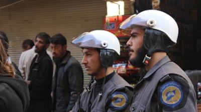  'I have pulled children out from under the rubble with my own hands. That's why I'm here now,' said protester and civil defence worker Abu Amer, pictured at right [Ward Mardini/Al Jazeera]