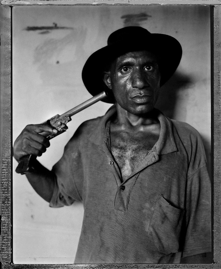 Gang member Andy Kei Ook in Port Moresby. 2004 [Stephen Dupont/Al Jazeera]