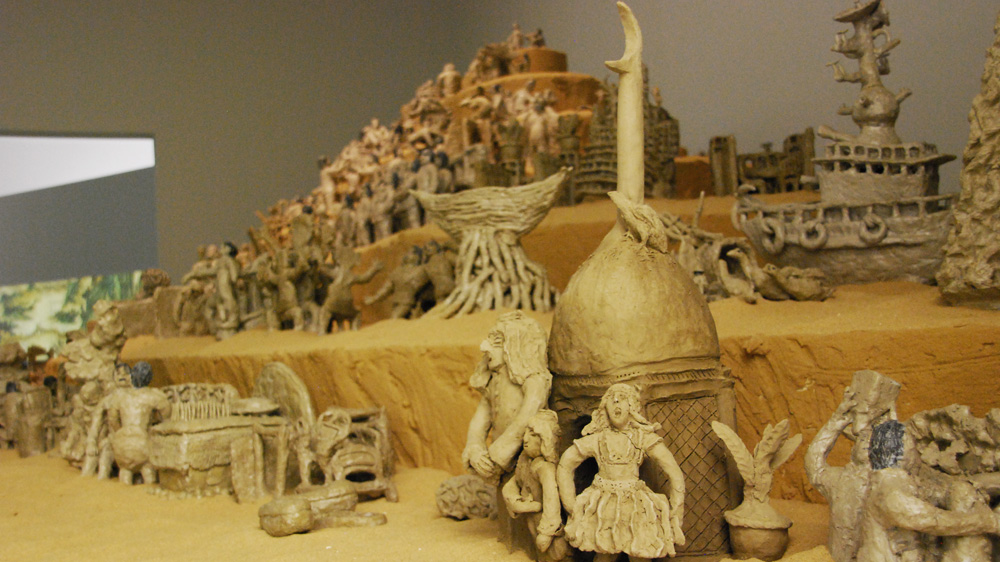 Hu's figurines were inspired by both Chinese and Qatari artists [Anna Nigmatulina/Al Jazeera] 