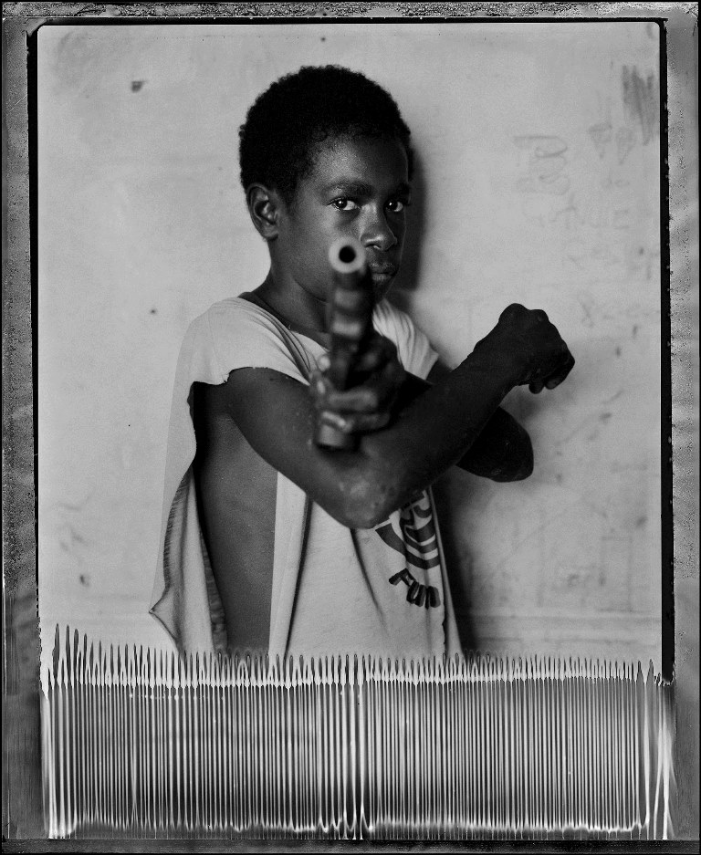 Gang member Mogii in Port Moresby. 2004 [Stephen Dupont/Al Jazeera]