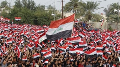 Supporters of Moqtada al-Sadr shout slogans during a protest against government corruption outside the Green Zone in Baghdad [REUTERS]