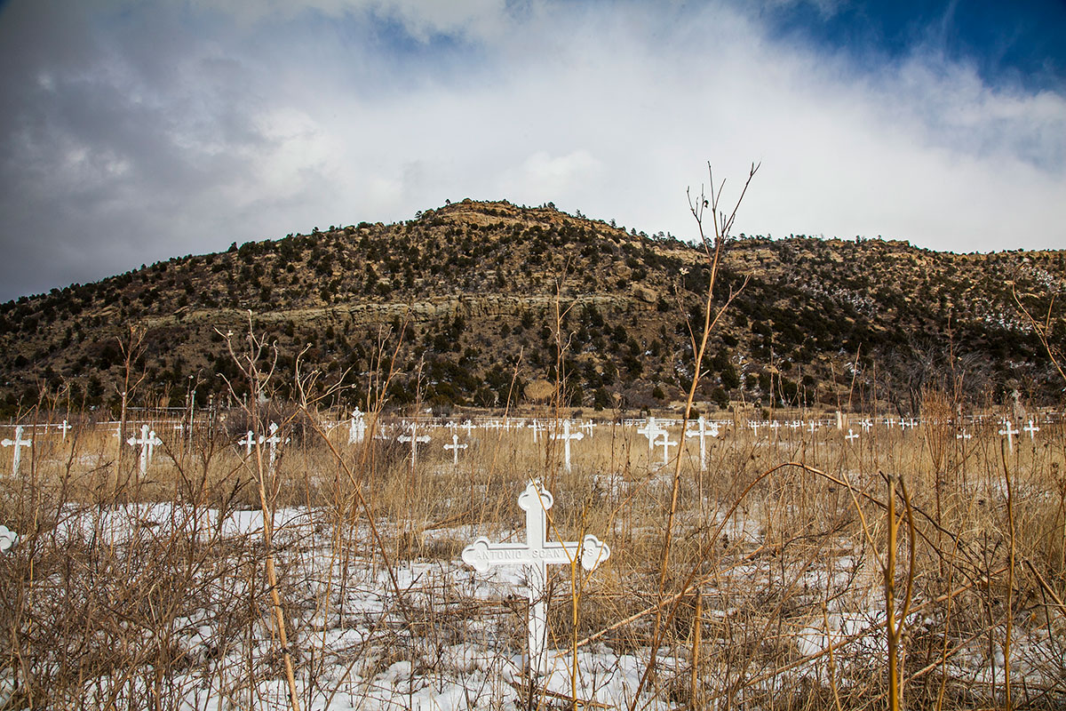 Crosses at Dawson graveyard marking two mining accidents that left more than 500 dead. At its height, the town of 9,000 boasted a football team, a bowling alley and an opera house [Gabriela Campos/Al Jazeera]