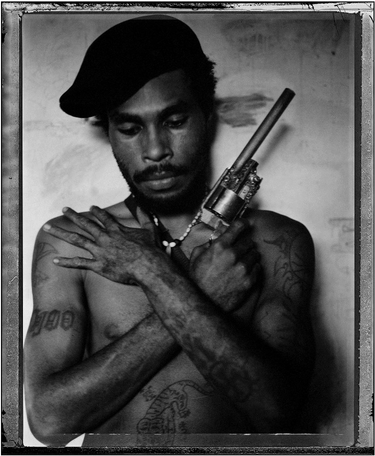 Gang member Omsy in Port Moresby. 2004 [Stephen Dupont/Al Jazeera]