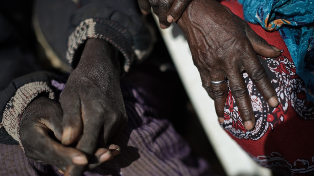 The injuries Kimweli Mbithuka and his wife, Naomi Nziula Kimweli, sustained mean that they have not had an intimate relationship since their detention [Phil Moore/Al Jazeera]