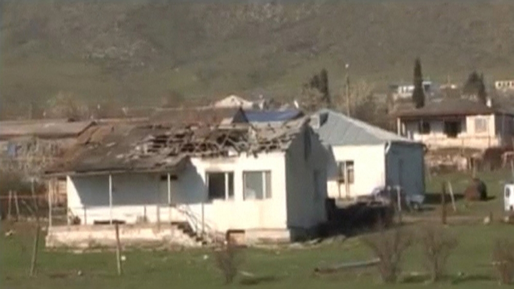 A house which was damaged during clashes between Armenian and Azeri forces is seen in Nagorno-Karabakh region [REUTERS]