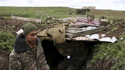 Soldiers of the self-defence army of Nagorno-Karabakh gather at their positions in Martakert province [Reuters]