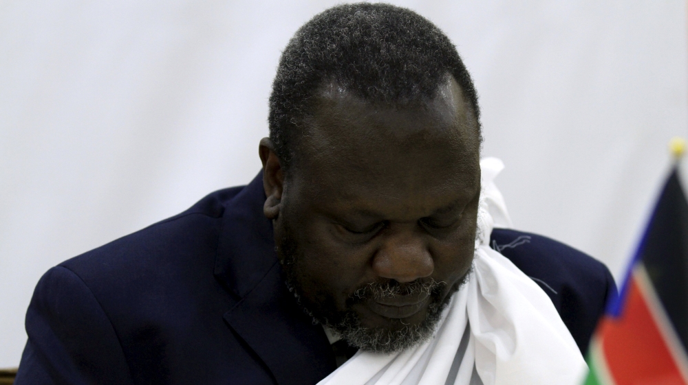 South Sudan''s opposition leader Riek Machar prays during a briefing ahead of his return to South Sudan as vice president, in Addis Ababa