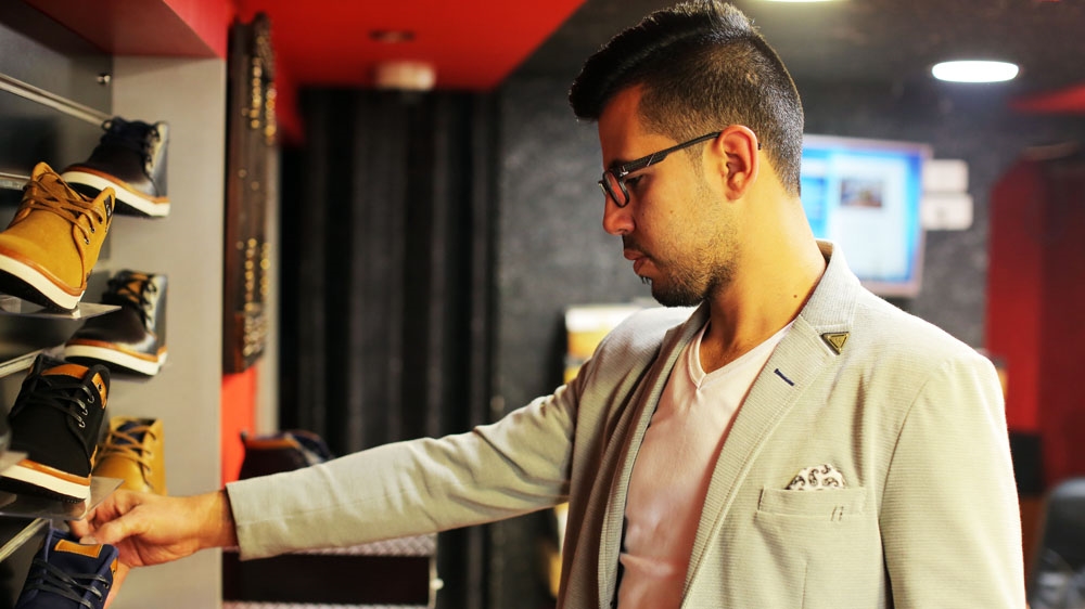 Although Yasin was at the top of his class in high school, no university would accept him without ID [Abed al-Qaisi/Al Jazeera]