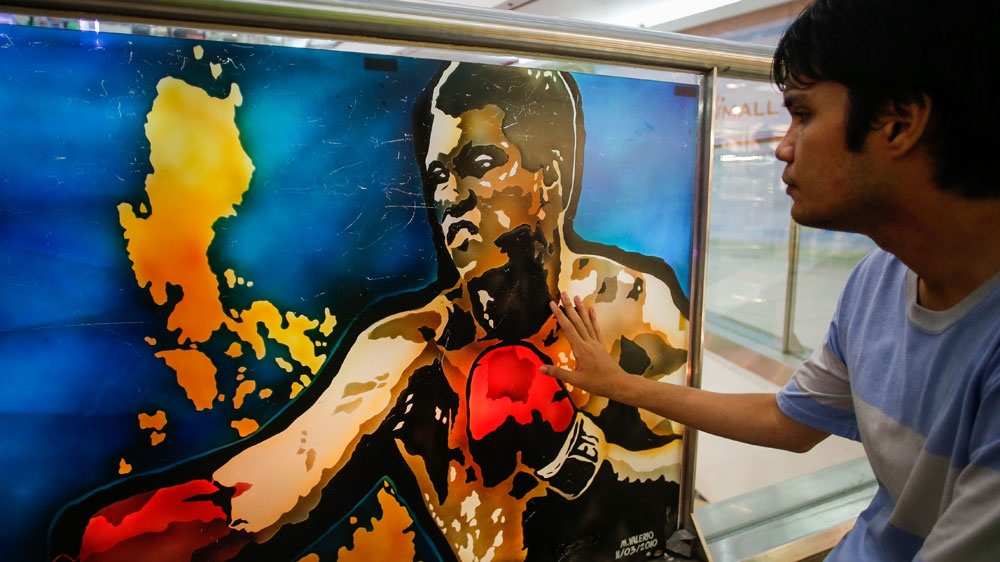 The 1975 heavyweight championship in Manila is considered by sport critics as one of the greatest boxing matches in history [EPA]