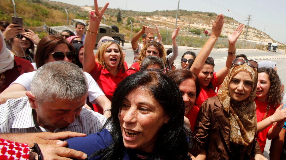 Jarrar was welcomed by Palestinian activists last month after her release from Israeli jail at a checkpoint near Tulkarm in the occupied West Bank [Abed Omar Qusini/Reuters]