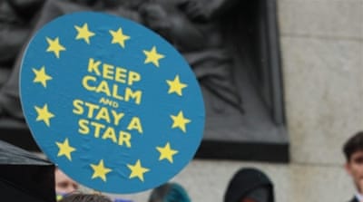 People take part in a demonstration in Trafalgar Square,  London, against the 