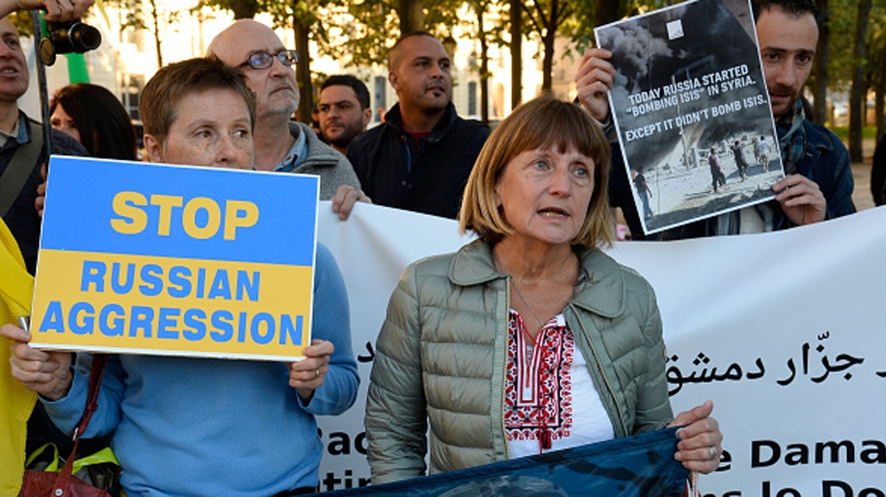 Anti-Putin demonstrators manifest their anger during President Vladimir Putin''s visit to Paris [Getty]