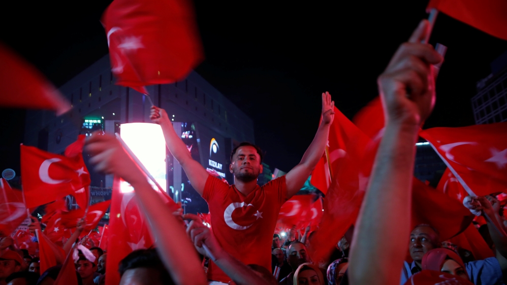 Supporters of Turkish President Tayyip Erdogan attend a pro-government demonstration in Ankara